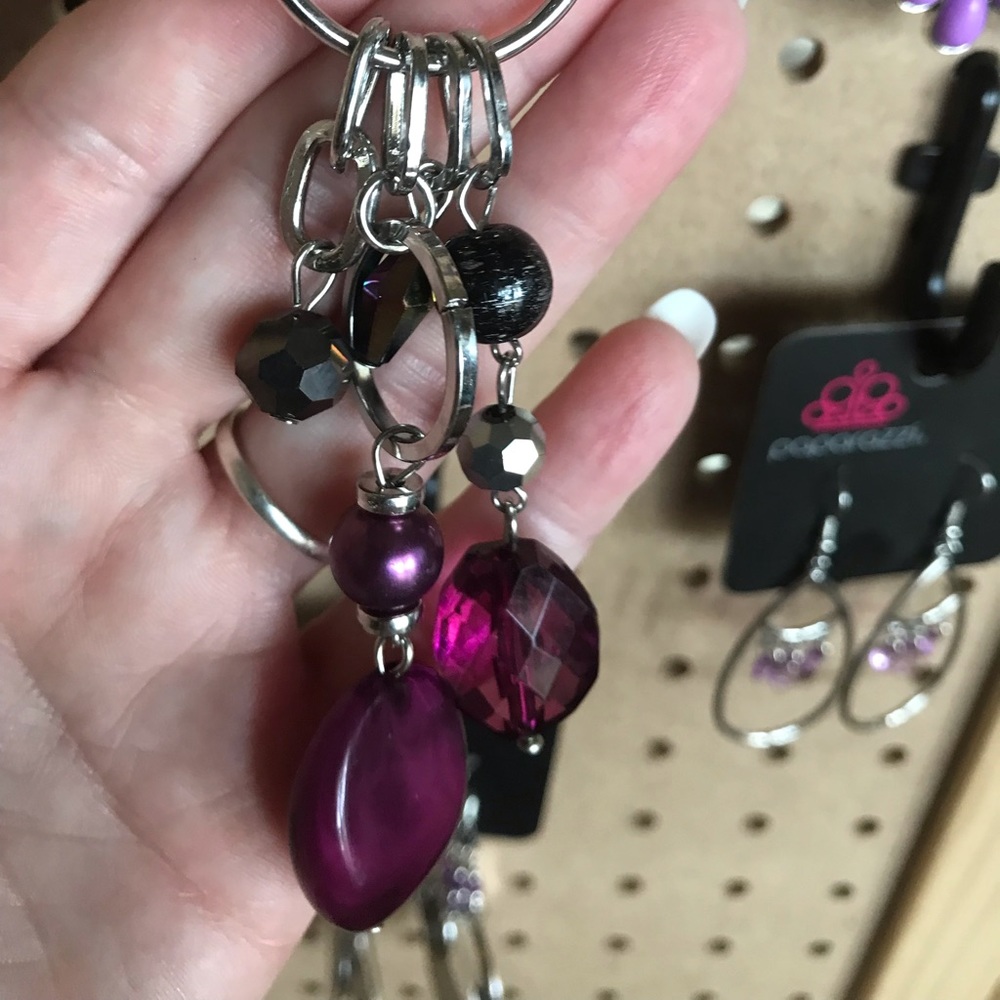Mid length silver necklace w/purple & black.